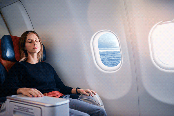 woman seat plane ()